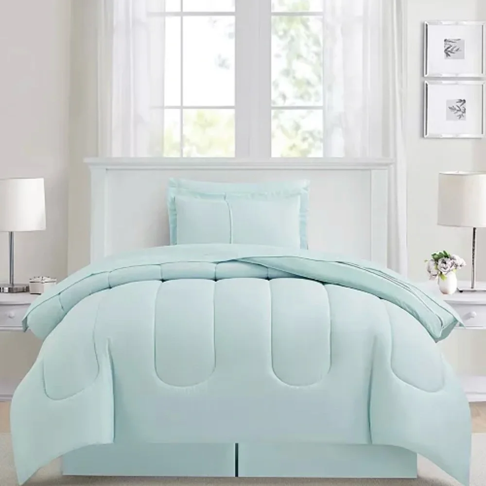 Reversible Color block w a seaside vibe, the Aiden comforter Set.